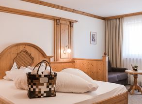 South Tyrol Hotel double room with sitting area and TV